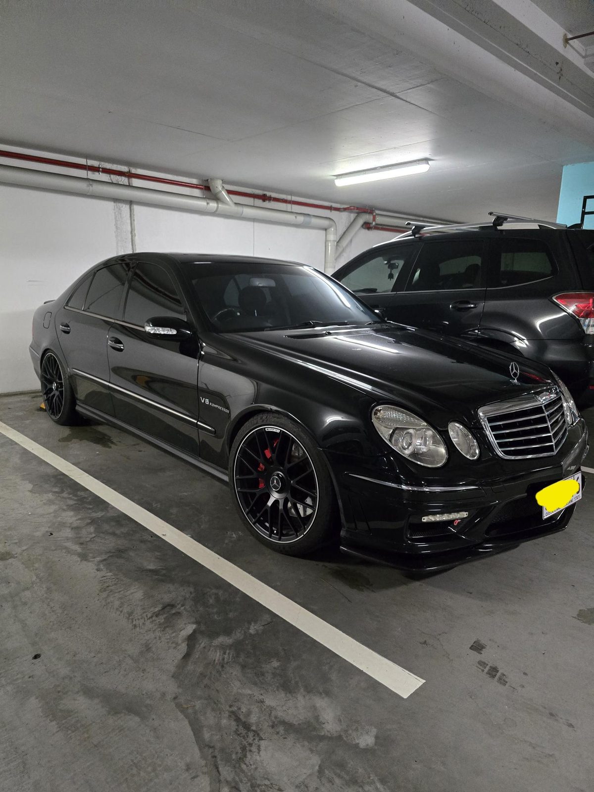Glossy black Mercedes-AMG after detailing